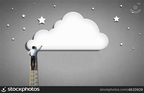Back view of businessman standing on ladder and reaching to cloud. Computing concept