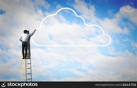 Back view of businessman standing on ladder and reaching to cloud. Computing concept