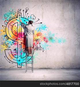 Back view of businesswoman. Back view of businesswoman drawing colorful business ideas on wall