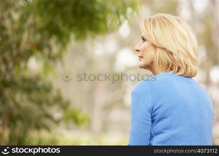 Back View Of Thoughtful Senior Woman