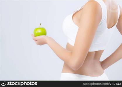 Back view portrait asian woman holding green apple fruit and beautiful body diet with fit isolated on white background, girl weight slim with cellulite or calories, health and wellness concept.