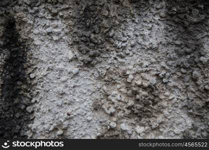 background and texture concept - close up of old stone wall or surface. close up of old stone wall or surface