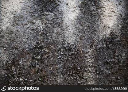 background and texture concept - close up of old stone wall or surface. close up of old stone wall or surface