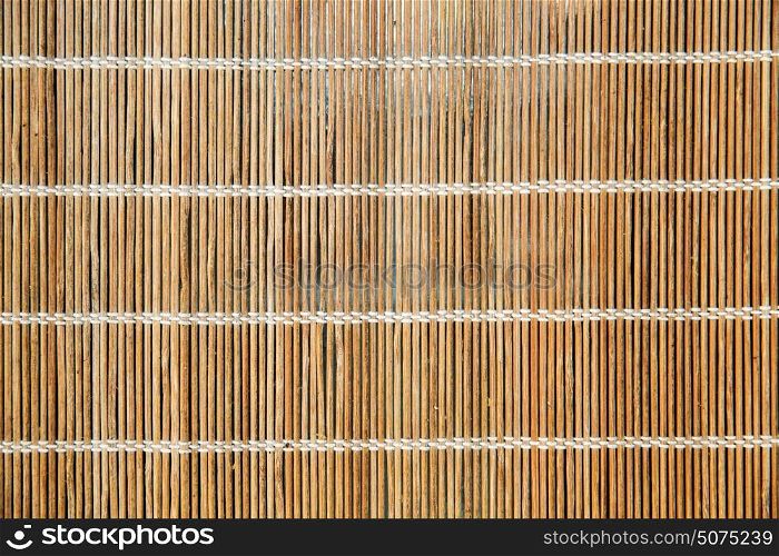 background and texture concept - natural bamboo mat or makisu. natural bamboo mat or makisu