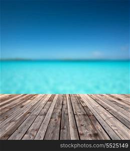 background and texture concept - wooden floor and blue sea