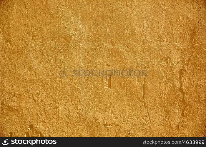 background and texture concept - yellow painted stone wall surface. yellow painted stone wall surface