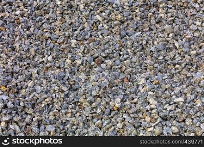 Background and texture of fine gray granite rubble. Fine granite rubble its texture and background