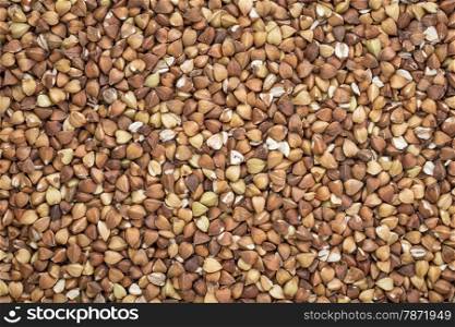 background and texture of roasted buckwheat kasha - gluten free grain