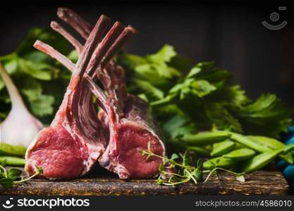 background, barbecue, board, bone, border, chop, closeup, color, cooking, cutlets, cutting, dark, food, fork, fresh, garlic, green, grill, herbs, ingredients, lamb, meat, pea, pepper, photography, pods, preparation, rack, raw, red, rosemary, rustic, shank, space, spice, steak, table, top, trimmed, uncooked, vegetable, view, white, wood, wooden, above, over, overhead