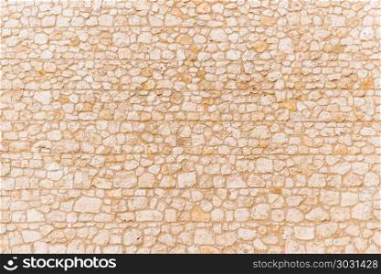 background beige walls of the medieval castle of stone