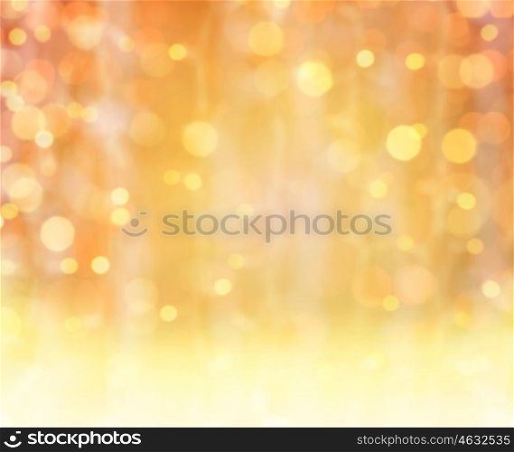 background, bokeh, holidays and backdrop concept - blurred christmas gold lights