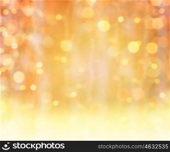 background, bokeh, holidays and backdrop concept - blurred christmas gold lights