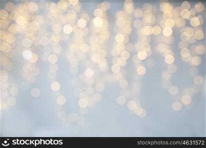 background, bokeh, holidays and backdrop concept - blurred christmas lights