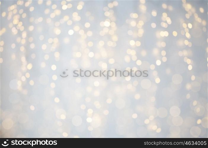 background, bokeh, holidays and backdrop concept - blurred christmas lights