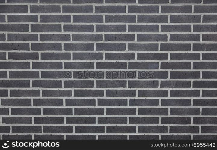background consisting of part of anthracite brick wall