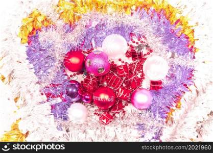 background decorated with sparkling garlands and pretty bright balls of colors for christmas and new year