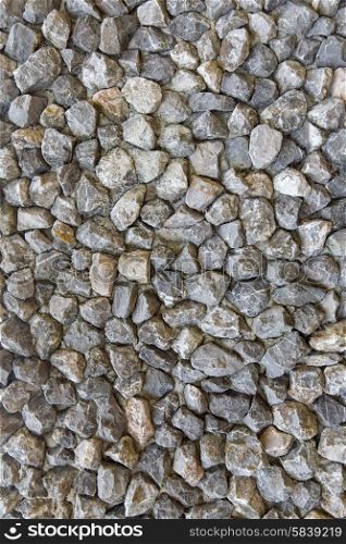 background, design and texture concept - grainy stone decorative tile texture
