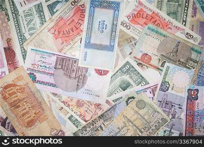 Background from banknotes of various monetary currencies