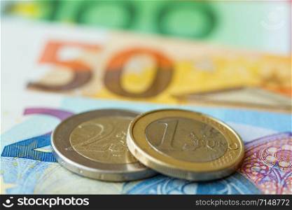 Background from euro money coins and banknotes