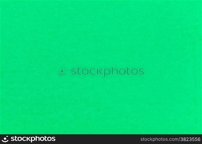 background from green color paper close up