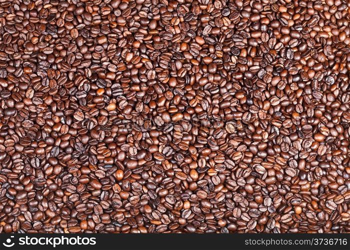 background from many roasted coffee beans