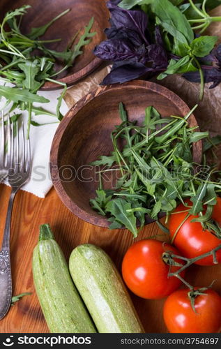 background from mixed vegetables with wooden bowl