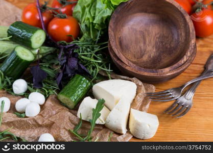 background from mixed vegetables with wooden bowl