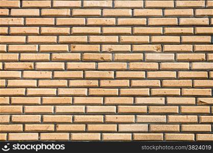 background from of yellow facing bricks wall
