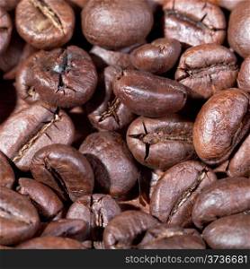 background from roasted coffee beans macro shot