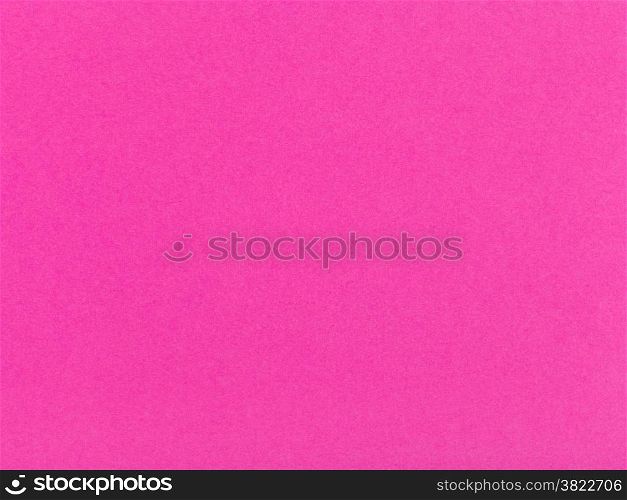 background from sheet of color dark pink paper close up