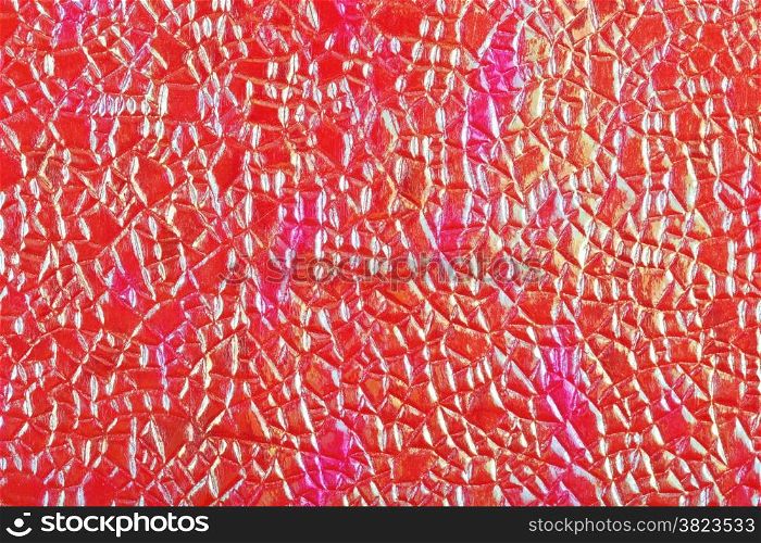 background from sheet of crimson textured color paper close up