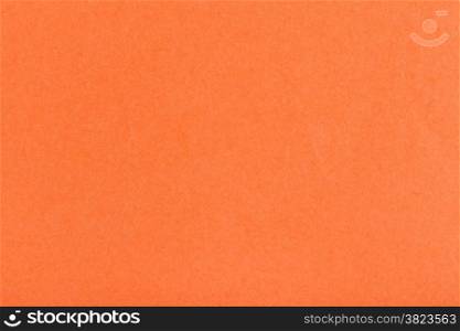 background from sheet of dark orange color fiber paper close up