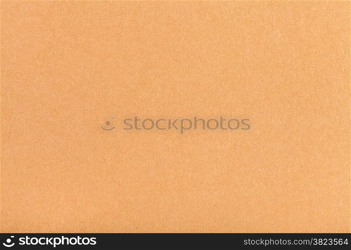 background from sheet of light brown pastel paper close up