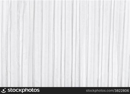 background from sheet of white corrugated paper close up