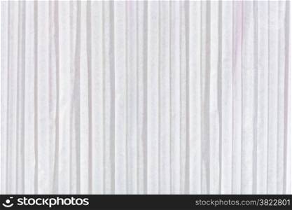 background from white light colored corrugated paper close up