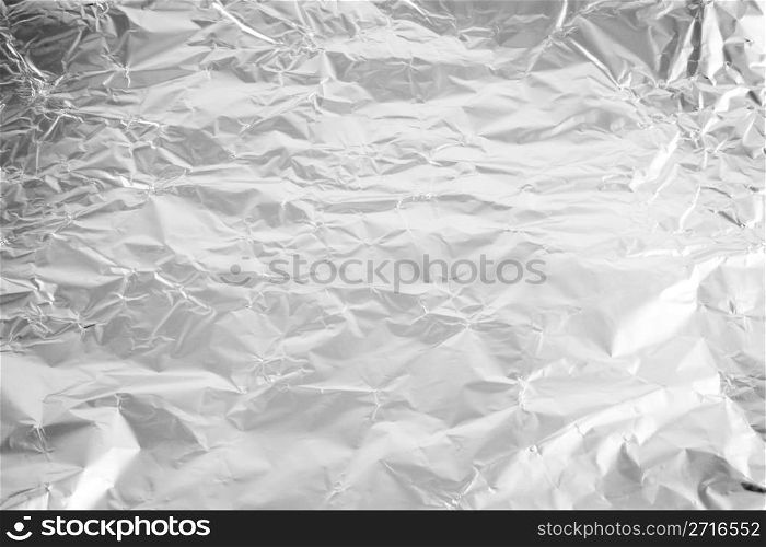 Background from wrinkled aluminum foil for cooking