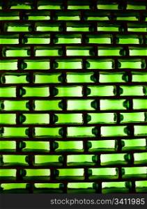 Background: green glass with a light from the back.