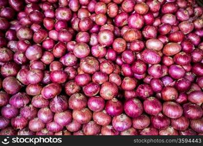 Background heads red onions