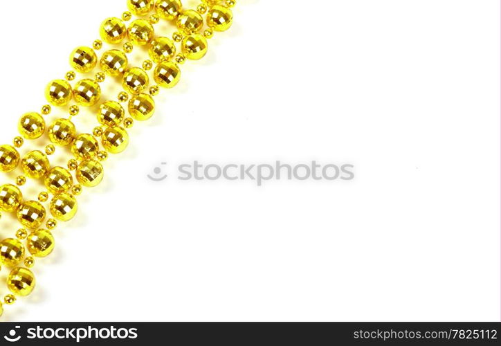 Background made of a brilliant celebratory beads of golden color