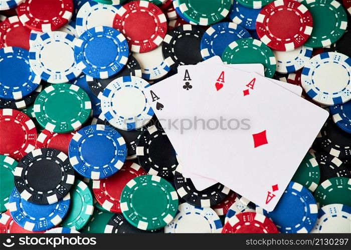 Background made of Casino pocker chips and playing cards.. Background made of Casino pocker chips and playing cards