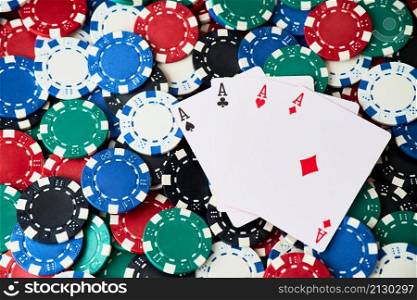 Background made of Casino pocker chips and playing cards.. Background made of Casino pocker chips and playing cards