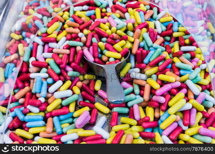 Background made of colorful sweets and candies. assortment colorful gummy candies at market