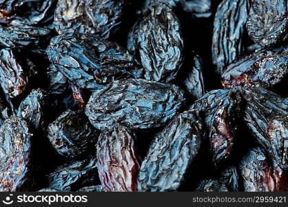 Background made of dark dried raisins