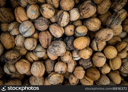 Background made of many walnuts.