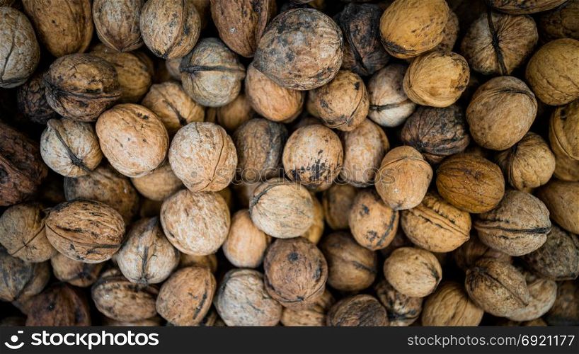 Background made of many walnuts.