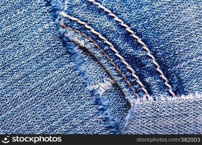 background made of old jeans rags close up