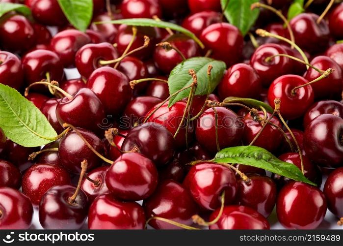 background made of sweet cherry fruits isolated on white background.. background made of sweet cherry fruits isolated on white background