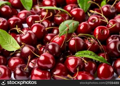 background made of sweet cherry fruits isolated on white background.. background made of sweet cherry fruits isolated on white background