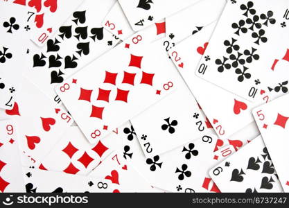 background made with playing cards randomly displaced