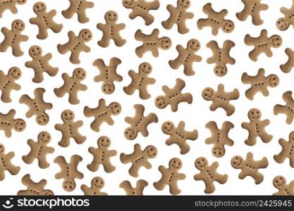 Background made with tens of homemade gingerbread man cookies